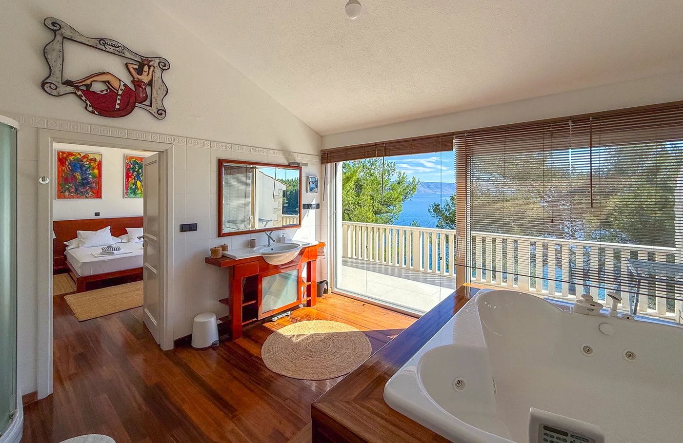Master Bedroom with en-suite bathroom at Villa Aqua — photo 10